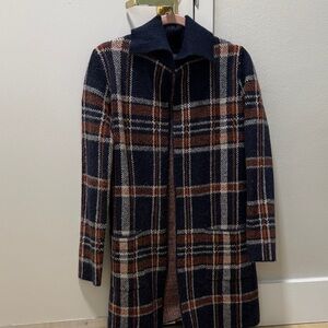 Tahari woman’s navy and rust wool jacket. No buttons